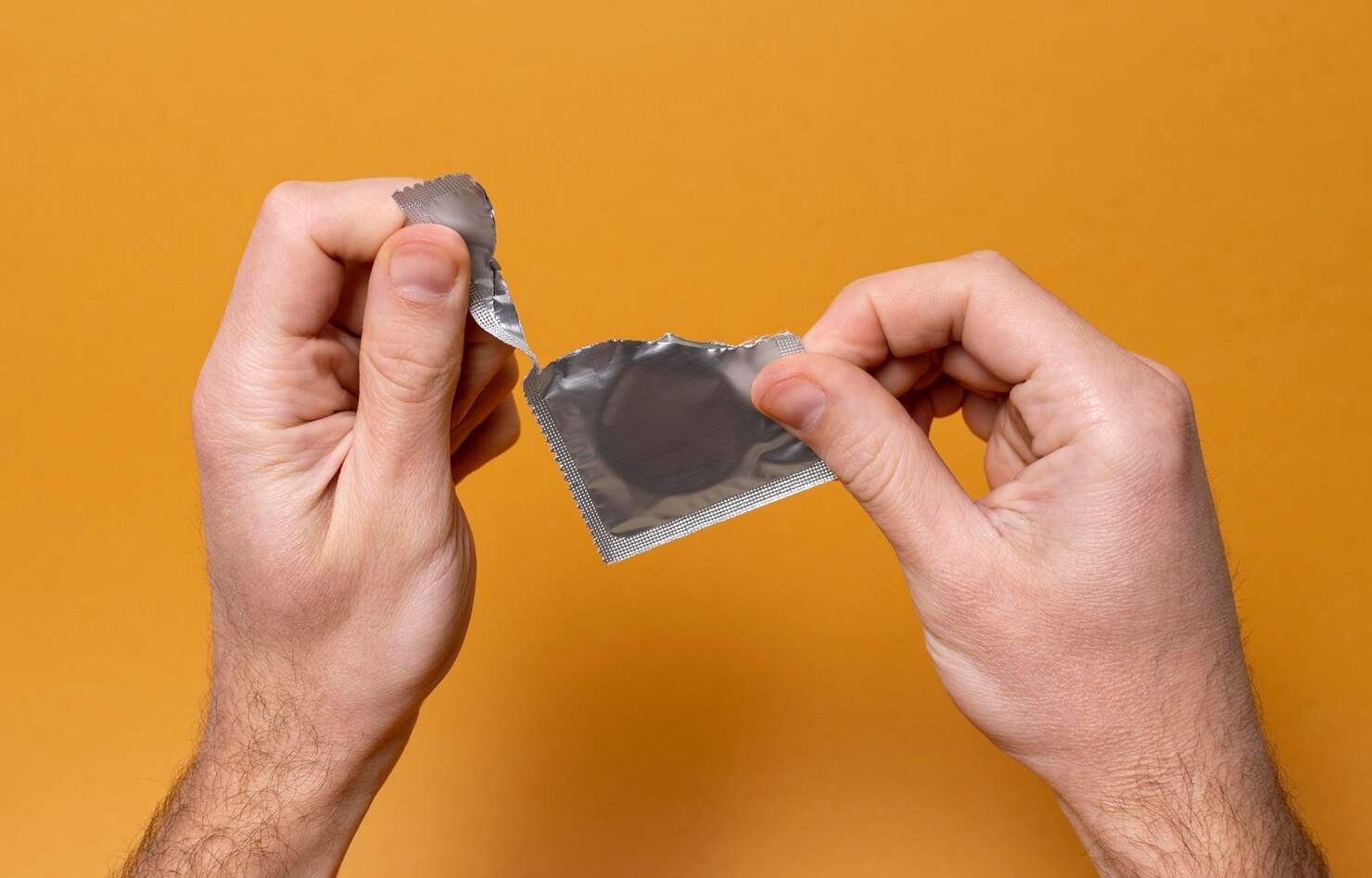 rozbalování kondomu